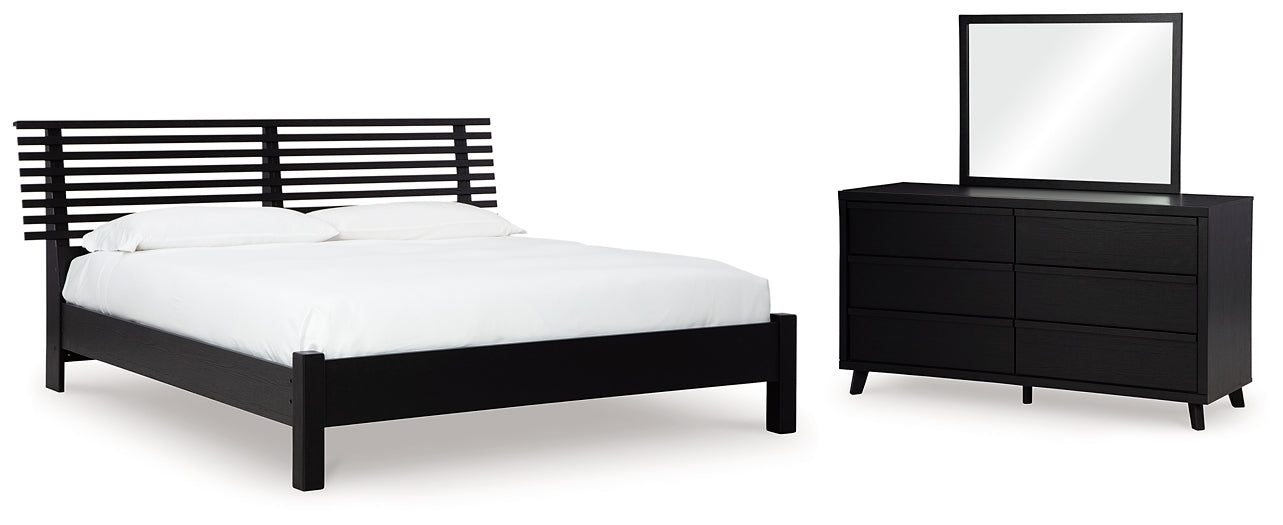 Danziar  Panel Bed With Mirrored Dresser