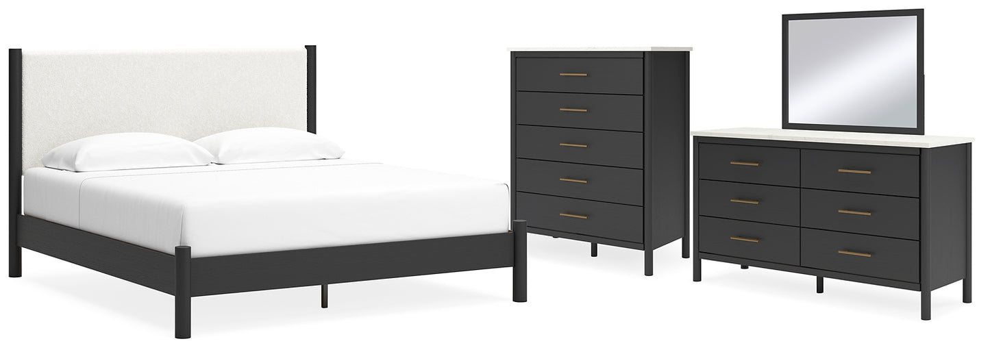 Cadmori  Upholstered Panel Bed With Mirrored Dresser And Chest