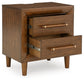 Lyncott  Upholstered Bed With Mirrored Dresser And Nightstand