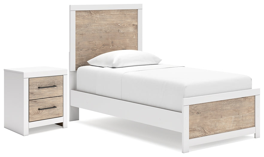 Ashley Express - Charbitt  Panel Bed With Nightstand