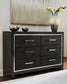 Kaydell /California King Upholstered Panel Headboard With Dresser