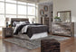 Derekson / Panel Headboard With Mirrored Dresser, Chest And Nightstand