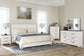 Gerridan  Panel Bed With Mirrored Dresser And Chest