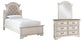 Realyn  Panel Bed With Mirrored Dresser