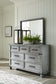 Russelyn  Storage Bed With Mirrored Dresser And Chest