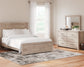 Senniberg  Panel Bed With Mirrored Dresser